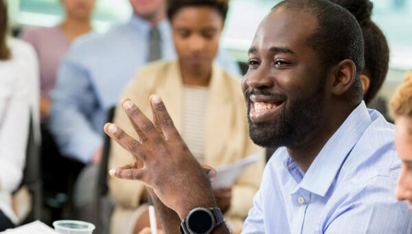 Business managers in a group meeting.