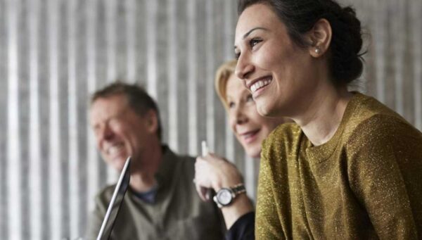 AS in Liberal Arts graduates conversing and smiling